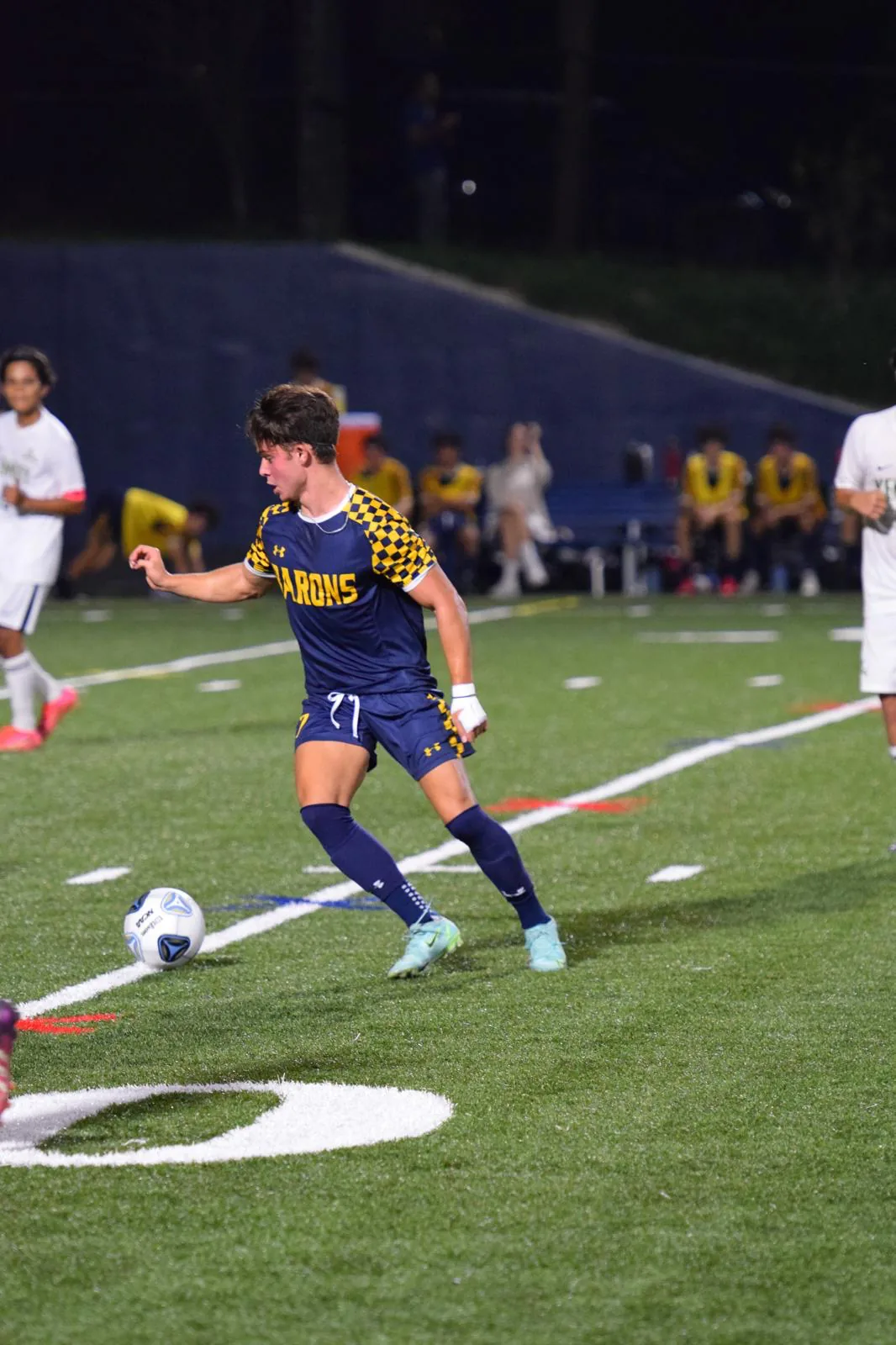 Aaron Samuel competing in a soccer match